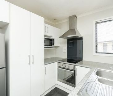 Discover modern comfort and convenience in this well-appointed two-... - Photo 3