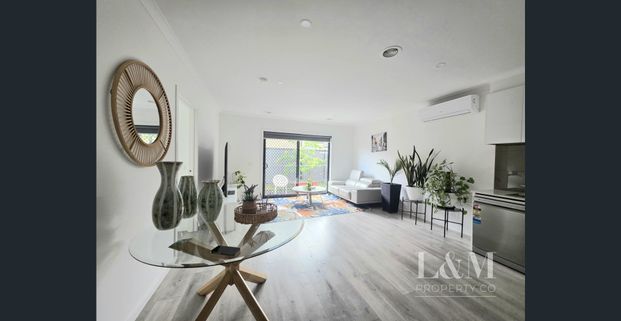 Comfortable Living with Easy Access to Local Amenities! - Photo 1