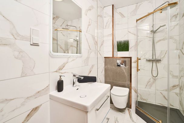 Kawalerka z balkonem i miejscem w garażu - Zdjęcie 1