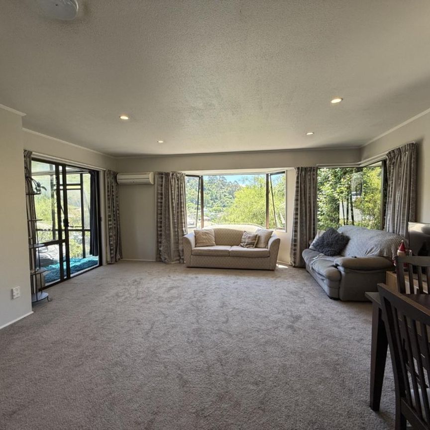 Modern Three-Bedroom Home with Sunroom and Stunning Views - Photo 1