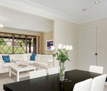 A Beautifully Designed Family Home with Space & Style! - Photo 1