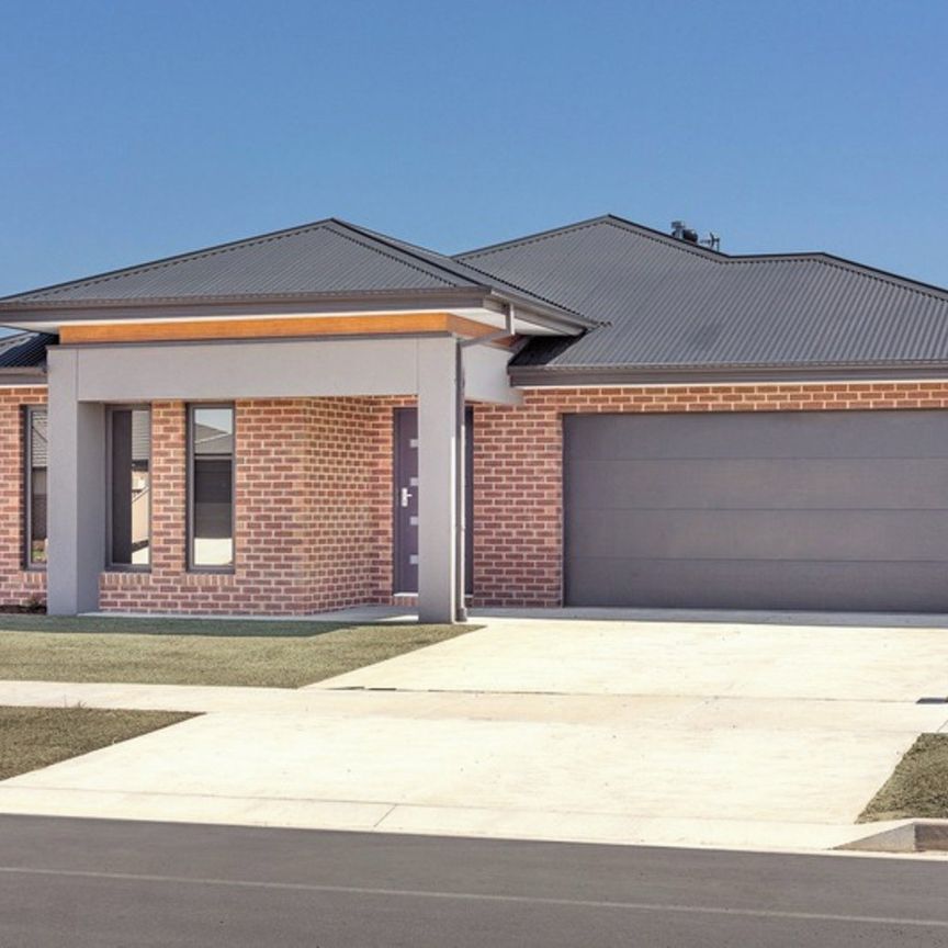 STUNNING FAMILY HOME ON LARGE BLOCK - Photo 1