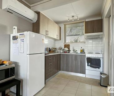 Very Neat 2-Bedroom Furnished Unit - Photo 4