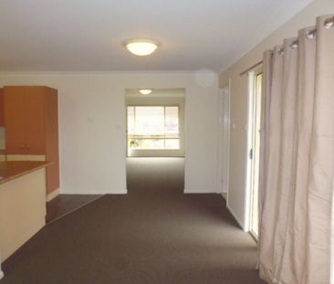 Well presented three bedroom home - Photo 4