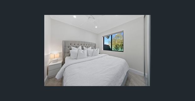 Modern 2 Bedroom Home + Entertainment Area - Photo 1