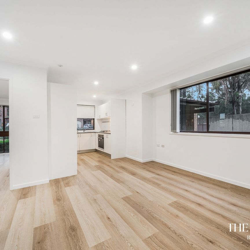Newly Renovated Family Home in Sought after Bossley Park - Photo 1