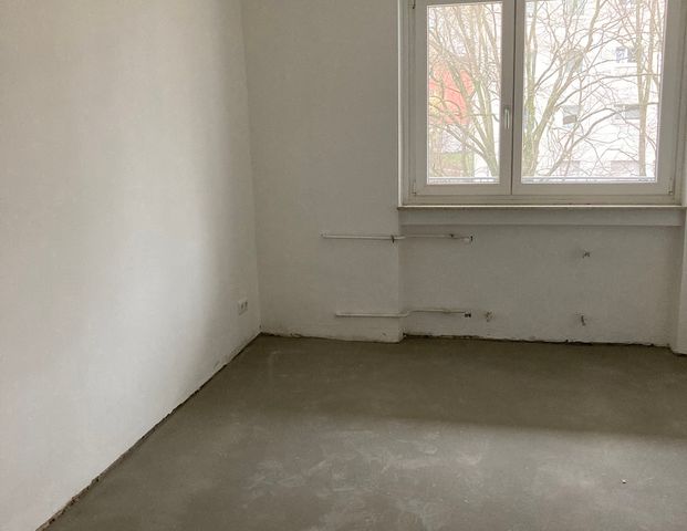 Gepflegte Wohnung mit gemütlichem Balkon für die Sonnentage im Jahr! - Photo 1