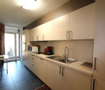 RUIM APPARTEMENT MET AUTOSTAANPLAATS - Photo 2