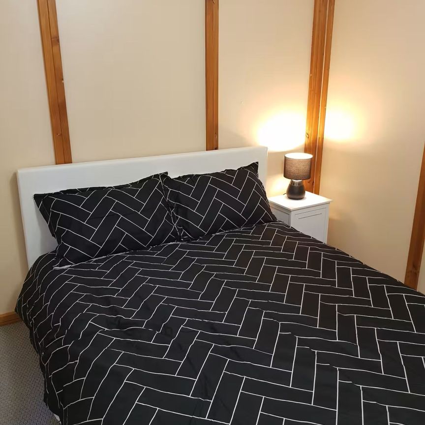 Neat & Tidy Fully Furnished 3-Bedroom Unit - Photo 1