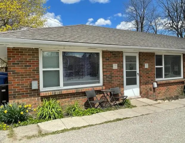 Parkland Village - 15 John - PARKING SPACE, HEAT & WATER INCLUDED | 15 John Street, Orangeville - Photo 1