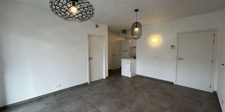 Appartement te huur in Marche-en-Famenne voor € 680 met 1 slaapkamer - Photo 4