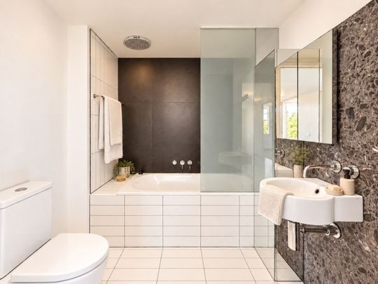 Modern and Stylish Two Bedroom Apartment! - Photo 1
