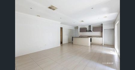 Spacious Family Living with Modern Comfort in Prime Location - Photo 2