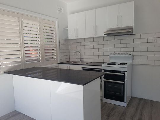 COMPLETELY RENOVATED - Photo 1