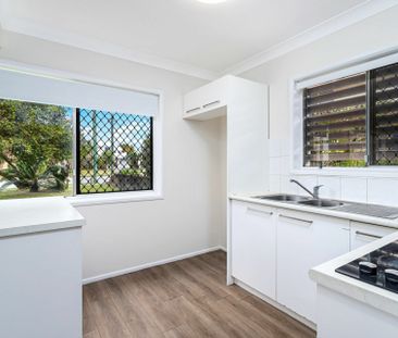 Spacious Three-Bedroom Unit in Convenient Location - Photo 3