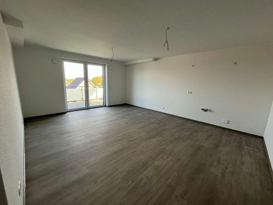 Modernes Wohnen - Exklusive DG-Wohnung in top Lage - Erstbezug - Photo 1