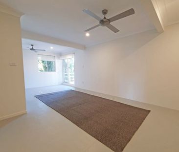 Beautiful Elevated Home with Sunlit Living and Flexible Spaces - Photo 4