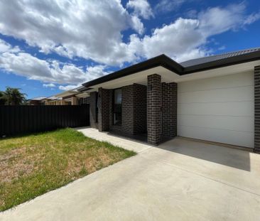 Modern Family Home in Sought after Location - Photo 1