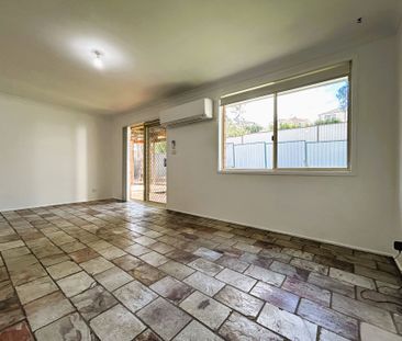 Stylish Renovated Home Offering Comfort, Space & Convenience - Photo 3