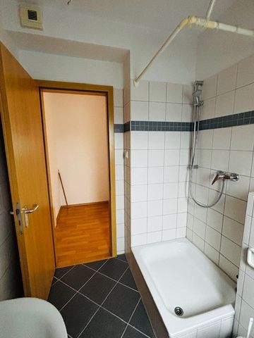 Helle 2-Zimmer-Dachgeschosswohnung freut sich auf Ihren Einzug - Photo 4