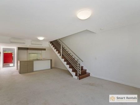Multi-level Apartment Living in the CBD - Photo 2