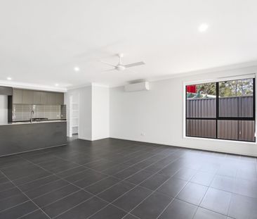 Modern Family Living in a Stunning Brand New Home - Photo 1