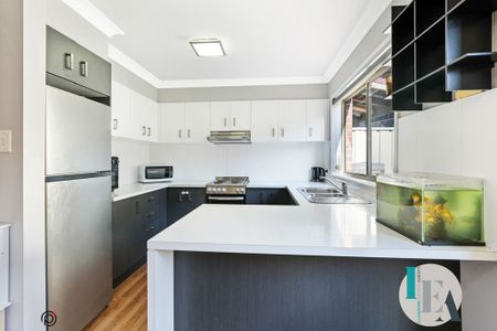 Immaculate Two-Bedroom Townhouse in Prime but Peaceful Location - Photo 3
