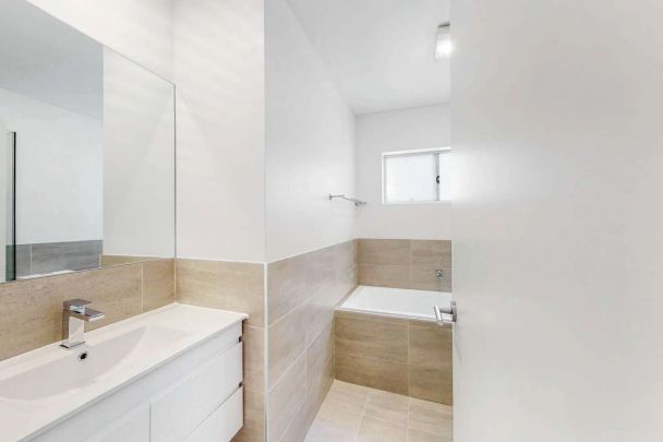 As New Modern 4 bedroom Home in Great Location - Photo 1