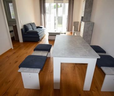 — Moderne 2-Zimmer-Gartenwohnung mit Terrasse & Carport in begehrte... - Photo 3