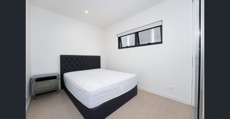 Modern 2-Bedroom Apartment in the Heart of Box Hill - Photo 4