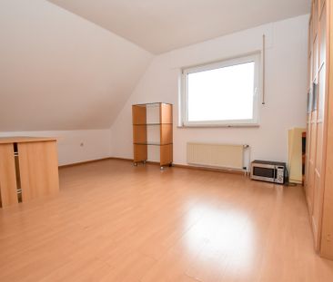 Dachgeschoswohnung mit Garage in ruhiger Siedlungslage in Markhausen - Foto 1