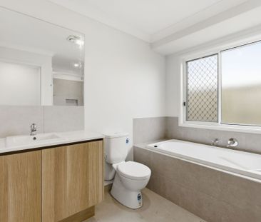 Brand New & Beautifully Designed Family Home - Photo 1