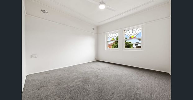 Contemporary 3-Bedroom Home with Garage - Photo 1