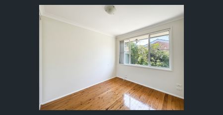 Charming Brick Home with Elegant Interiors and Low Maintenance Courtyard - Photo 3