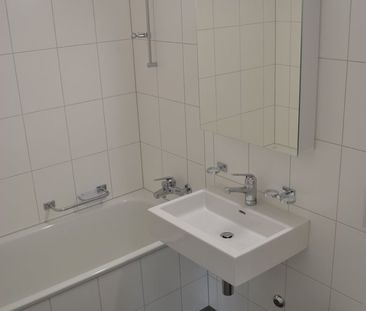 Moderne Wohnung an lebhafter Lage - Foto 3