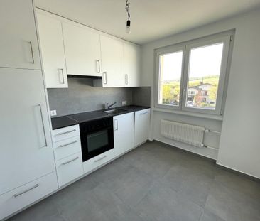 Appartement de 4 pièces entièrement rénové au 1er étage à Porrentruy - Photo 4