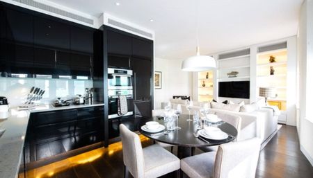 A two bedroom apartment of approximately 1004 square feet. - Photo 2