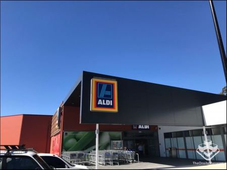 Right behind WOOLWORTH shopping center, CITY BUSE AND CHILDCARE - Photo 5