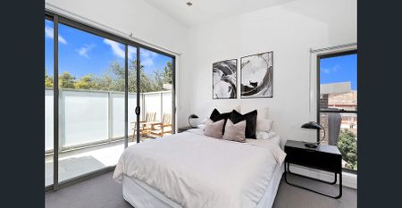 Striking Style, Sophisticated Living - Spacious Three-Level Townhouse! - Photo 3