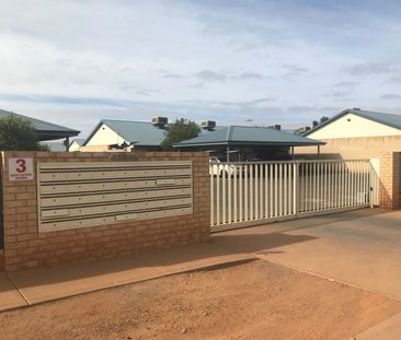 Tidy Unit in a Gated complex with sparkling pool! - Photo 5