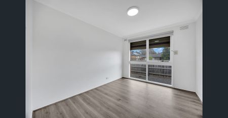 Bright Family Home with Space, Style & Security - Photo 5