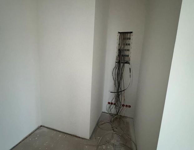 Erstbezug Helle 3 Raumwohnung Fußbodenheizung - Foto 1
