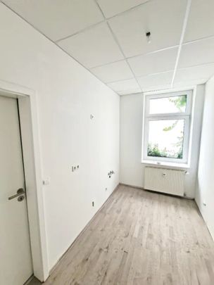 Modernisierte 1,5-Zimmer-Erdgeschosswohnung mit Stil und Komfort - Foto 1