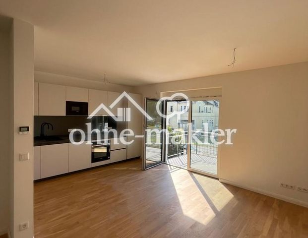 Exklusive 3-Zimmer-Neubauwohnung mit zwei Balkonen, hochwertiger Ausstattung und Seeblick - Foto 1