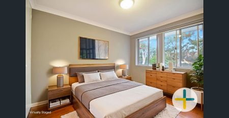 CONVENIENT, NTH-FACING, RENOVATED 2 BEDROOM UNIT - Photo 2