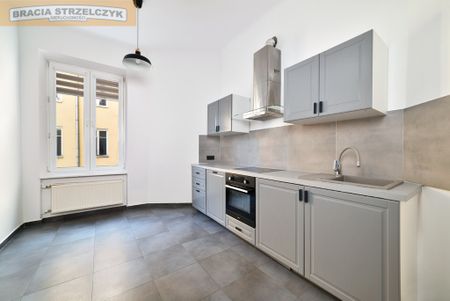 Klimatyczna, nowoczesna przestrzeń w kamienicy z 1897 roku. - Photo 4