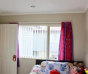 This immaculate four bedroom home is both private and welcoming and... - Photo 5