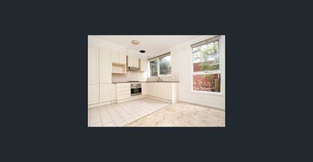 Spacious, sun filled & ideally located - Photo 2