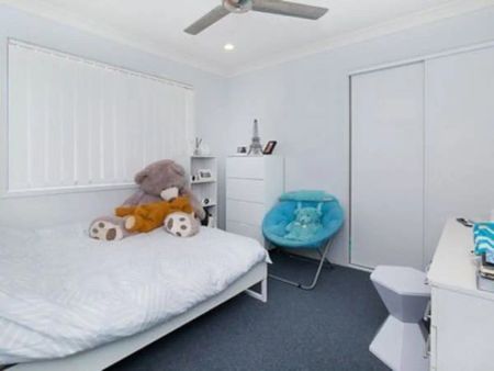 “Spacious and Stylish Home in the Heart of Raceview” - Photo 4