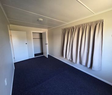 Charming 3BR Home - Photo 2